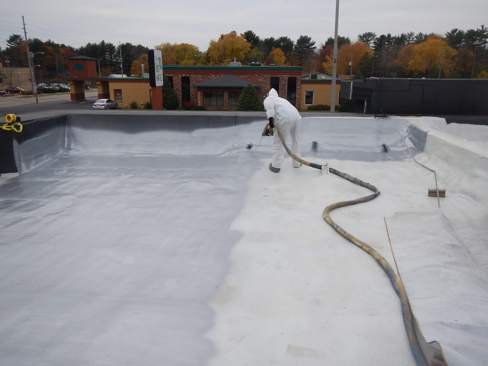 Aluminum panel roof prepared for polyurea coating application